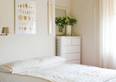 Calm and neutral colours and decor for a bedroom